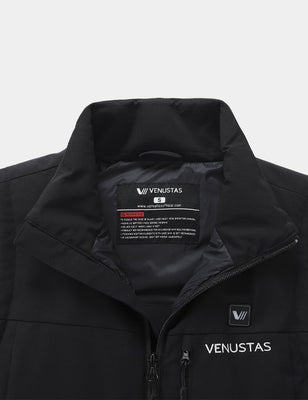 Black heated softshell golf vest with open collar, inner label, and chest power button