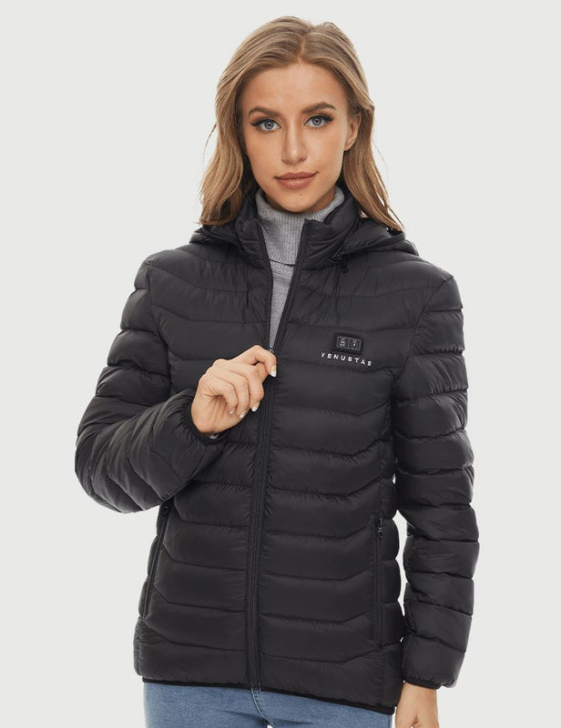 Woman wearing a black hooded heated jacket from the front