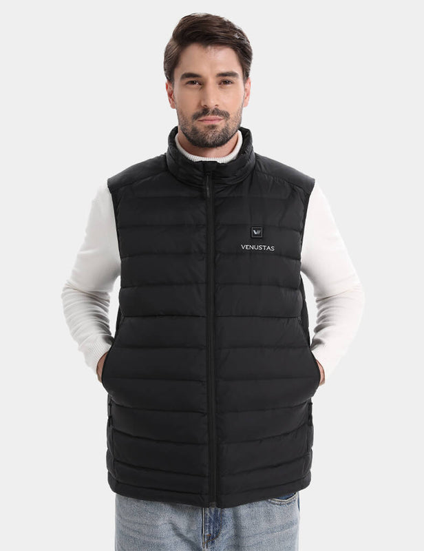 Black heated vest front view with stand collar and hands in pockets