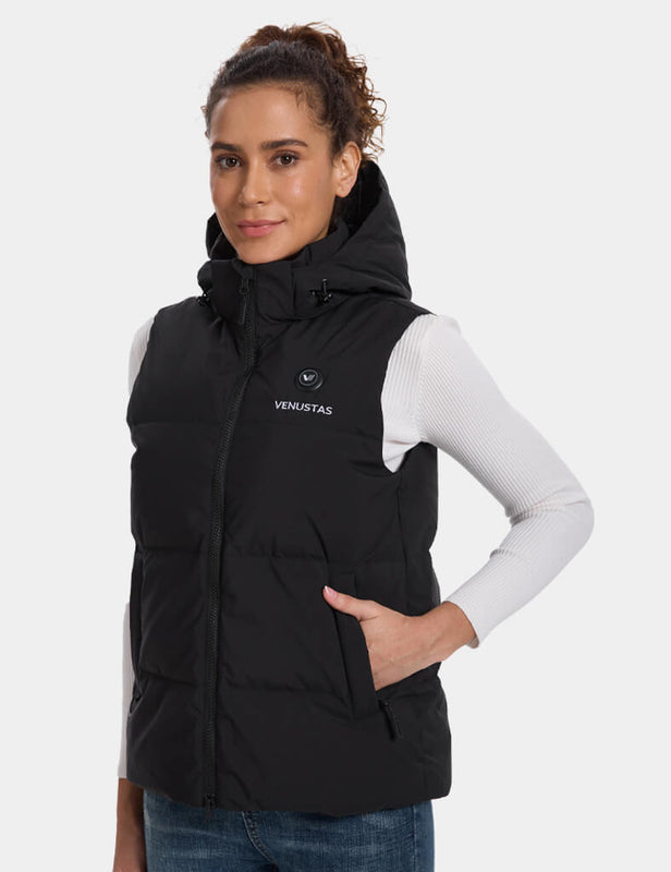 Black hooded women's heated vest on model, angled front view