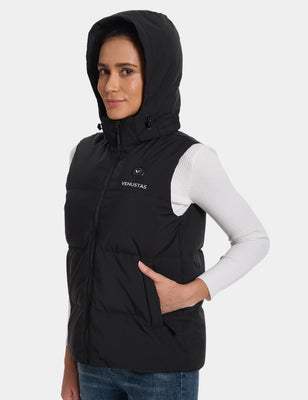Side view of a black hooded heated vest with the hand pocket in use