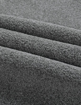 Close-up of gray fleece fabric texture on the heated vest
