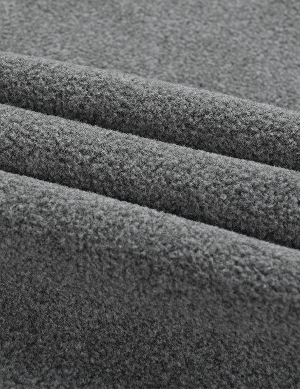 Close-up of gray fleece fabric texture on the heated vest