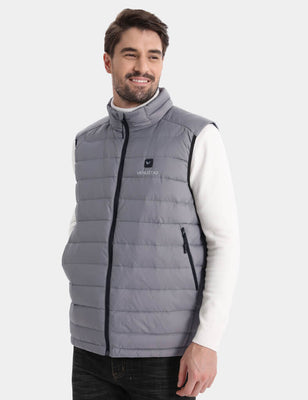 Front view of gray quilted heated vest with black zipper on a model