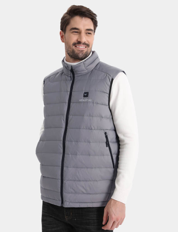 Front view of gray quilted heated vest with black zipper on a model