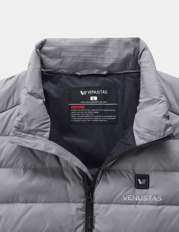 Open collar of gray heated vest showing the inner label and black lining