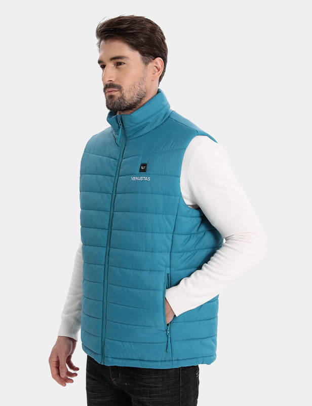 Man wearing a teal heated vest over a white sweater, front view