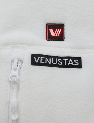 White fleece heated vest close-up with illuminated control button and zipper